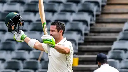 Logo of Elgar ton leads the way, but Karunaratne battles back