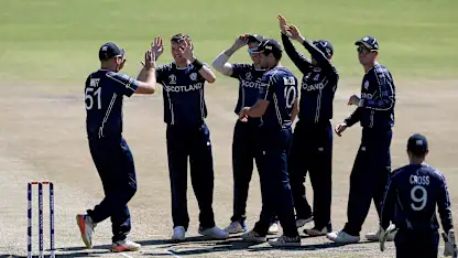 Logo of Stuart Whittingham (2ndL) of Scotland celebrates with teamates after taking the wicket of Dipendra Airee of Nepal during the ICC Cricket World Cup Qualifier between Scotland v Nepal at Queens Sports Club on March 8, 2018 in Bulawayo, Zimbabwe (©ICC).