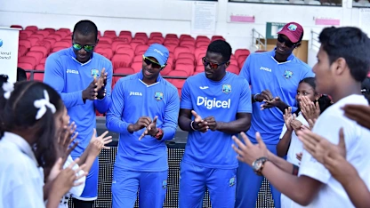 Darren_Sammy_leads_the_how_to_wash_hands_example_at_West_Indies_Cricket_for_Good_clinic