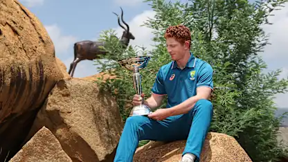 Hugh Weibgen with the U19 Men's CWC Trophy