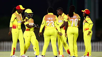 Players of Uganda celebrate taking a wicket during the ICC Women's T20 World Cup Qualifier 2024 match between Scotland and Uganda at Tolerance Oval on April 25, 2024 in Abu Dhabi, United Arab Emirates.