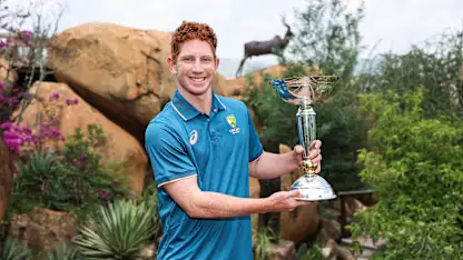 Hugh Weibgen with the U19 Men's CWC Trophy
