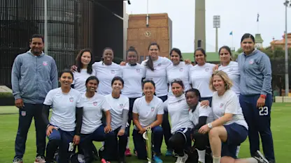 Logo of USA Women's team poses with the trophy at the Sydney Cricket Ground in Australia