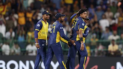 Maheesh Theekshana of Sri Lanka celebrates the wicket of Finn Allen