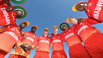 Logo of Zimbabwe U19 gather in a huddle before their first warm-up match against New Zealand.
