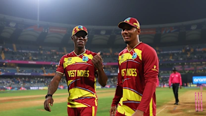 West Indies players celebrate following the ICC Men's T20 World Cup 2026 Super 8 match between Zimbabwe and West Indies at Wankhede Stadium