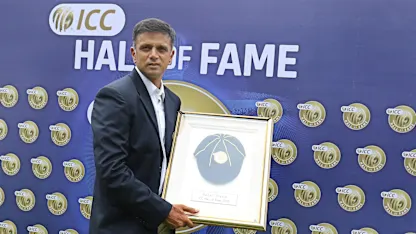 Logo of Rahul Dravid poses for the photographers with his ICC Cricket Hall of Fame cap