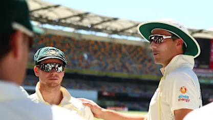 Logo of Pat Cummins and Steve Smith