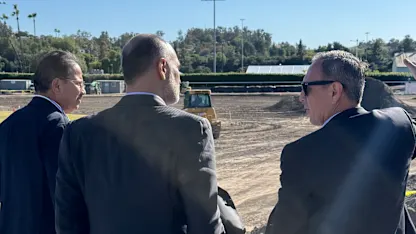 Mysore, Gupta and Marquez (left to right) watch ongoing work at the Fairplex Grounds in Pomona.