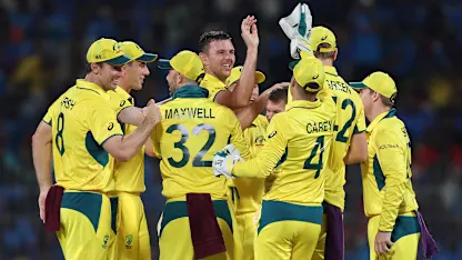 Logo of Josh Hazlewood of Australia celebrates with teammates after taking the wicket of Shreyas iyer of India during the ICC Men's Cricket World Cup India 2023 between India and Australia 