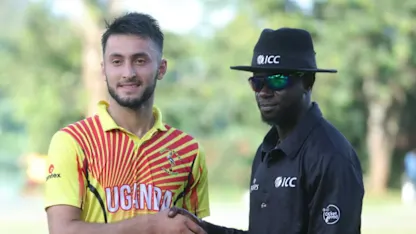 Logo of Player of the match Riazat Ali Shah receives his award from Nigerian umpire Kehinde Olanbiwonnu  (1)