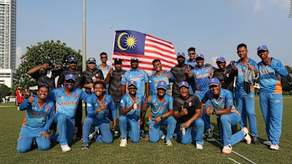Logo of Malaysia team celebrates after winning their opening encounter against Uganda