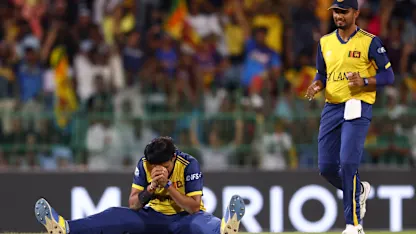 Maheesh Theekshana gratefully clutches onto the catch