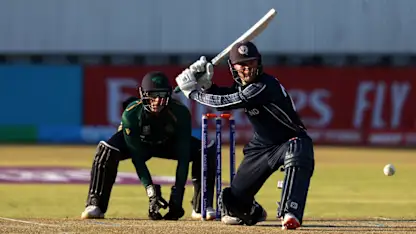 Logo of Michael Leask of Scotland sweeps the ball for a four during the ICC Men's Cricket World Cup Qualifier Zimbabwe 2023 match between Ireland and Scotland at Queen’s Sports Club on June 21, 2023 in Bulawayo, Zimbabwe.