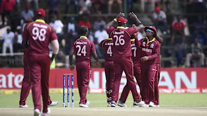 Windies players celebrate the wicket of Michael Jones of Scotland during The ICC Cricket World Cup Qualifier between The Windies and Scotland at The Harare Sports Club on March 21, 2018 in Harare, Zimbabwe (©ICC).