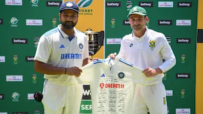 Elgar presented with a special autographed jersey from India players