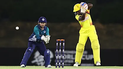 Proscovia Alako of Uganda plays a shot as Nannapat Koncharoenkai of Thailand keeps during the ICC Women's T20 World Cup Qualifier 2024 match between Uganda and Thailand at Tolerance Oval on April 29, 2024 in Abu Dhabi, United Arab Emirates.