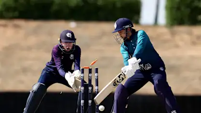 Nannapat Koncharoenkai of Thailand is bowled out by Abtaha Maqsood of Scotland.