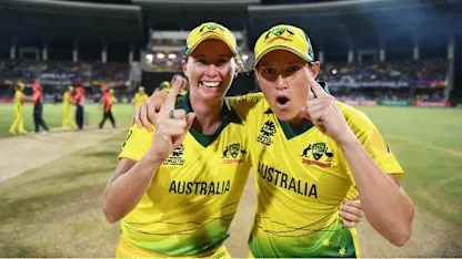Logo of Australia's players react in the immediate aftermath to their WT20 title win