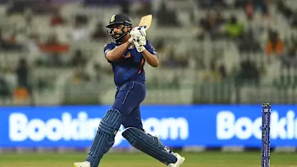 Logo of Rohit Sharma sizzles with brilliant half-century