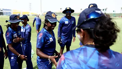 Shashini Gimhani of Sri Lanka shakes hands with with teammates before making her debut during the ICC Women's T20 World Cup Qualifier 2024 match between Sri Lanka and Uganda at Zayed Cricket Stadium on May 01, 2024 in Abu Dhabi, United Arab Emirates.