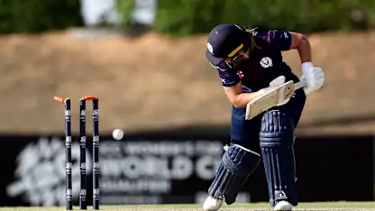Megan McColl of Scotland is bowled out by Chanida Sutthiruang of Thailand