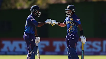 Logo of Dimuth Karunarathana and Sadeera Samarawickrama of Sri Lanka fist bump during the ICC Men's Cricket World Cup Qualifier Zimbabwe 2023 match between the Sri Lanka and Ireland