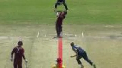Brad Wheal gets Evin Lewis lbw for 66