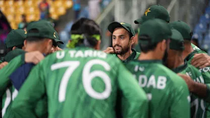 Pakistan team huddle with Salman Ali Agha