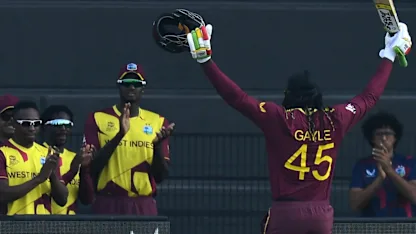 Logo of West Indies and fans applaud Chris Gayle off the field
