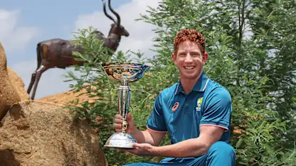 Hugh Weibgen with the U19 Men's CWC Trophy