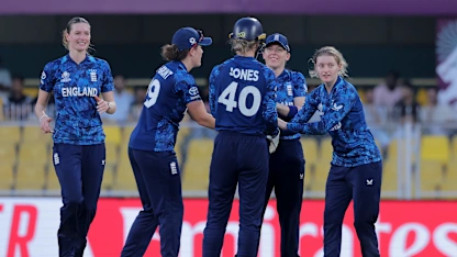 Charlie Dean of England (R) celebrates with team mates after taking the wicket of Shorna Akter of Bangladesh 