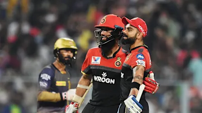 Logo of Kohli and Moeen Ali
