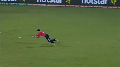 Morgan dives to take brilliant catch