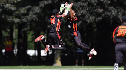 Logo of Sema Kamea takes PNG's first wicket of the tournament and has a celebration to match!