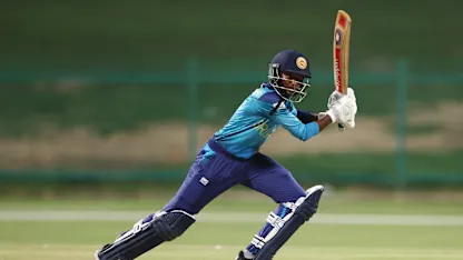 Kavisha Dilhari of Sri Lanka plays a shot during the ICC Women's T20 World Cup Qualifier 2024 Final match between Scotland and Sri Lanka at Zayed Cricket Stadium on May 07, 2024 in Abu Dhabi, United Arab Emirates.