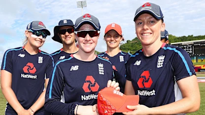 Logo of Heather Knight of England presents Kirstie Gordon of England with her first cap during the ICC Women's World T20 2018 match between England and Bangladesh at Darren Sammy Cricket Ground on November 12, 2018 in Gros Islet, Saint Lucia.