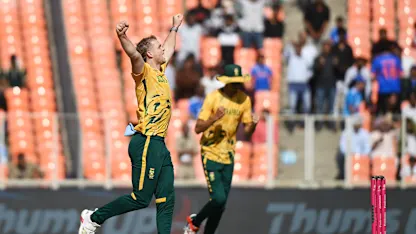 Corbin Bosch of South Africa celebrates the wicket of Sherfane Rutherford