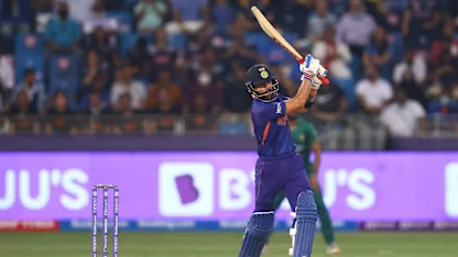 Logo of Virat Kohli hits one over long-on with class