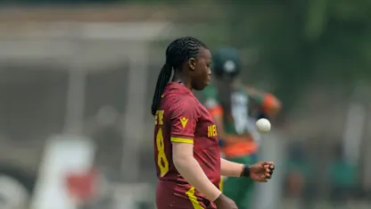 Logo of Aaliyah Alleyne prepares to bowl