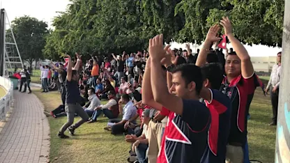 Nepal fans cheer during their side's win over UAE