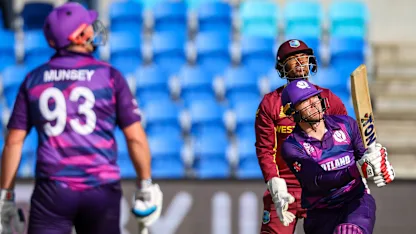 Six: Richie Berrington launches into the stands for Scotland