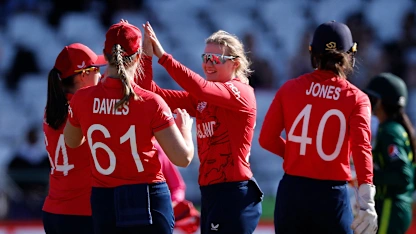 Logo of England's Charlie Dean celebrates with teammates after the dismissal of Pakistan's Muneeba Ali during the Group B T20 women's World Cup cricket match between England and Pakistan 1920x1080