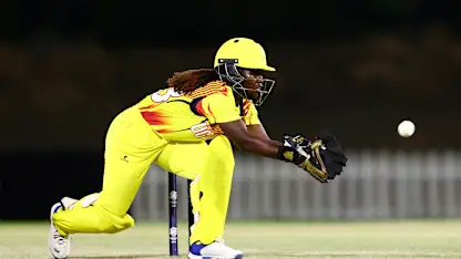 Kevin Awino of Uganda fields during the ICC Women's T20 World Cup Qualifier 2024 match between Scotland and Uganda at Tolerance Oval on April 25, 2024 in Abu Dhabi, United Arab Emirates.