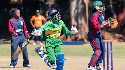 Logo of Rwanda batter Nyirankundineza celebrates