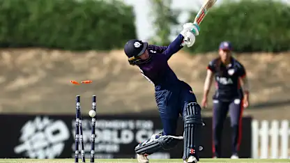 Katherine Fraser of Scotland is bowled by Isani Vaghela of USA during the ICC Women's T20 World Cup Qualifier 2024 match between USA and Scotland at Tolerance Oval on April 29, 2024 in Abu Dhabi, United Arab Emirates.
