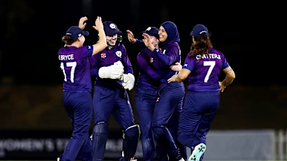 Abtaha Maqsood of Scotland celebrates with teammates after taking the wicket of Evelyn Anyipo of Uganda (not pictured) during the ICC Women's T20 World Cup Qualifier 2024 match between Scotland and Uganda at Tolerance Oval on April 25, 2024 in Abu Dhabi, United Arab Emirates.