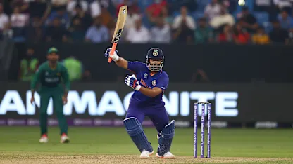 Logo of Pant hits two one-handed sixes