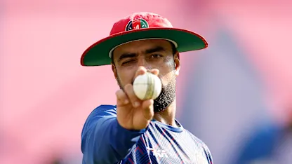 Logo of Rashid Khan Arman of Afghanistan bowls in the nets at HPCA Stadium in Dharamsala during a training session on October 06, 2023 in Dharamsala