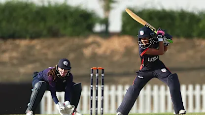 Isani Vaghela of USA plays a shot as Sarah Bryce of Scotland keeps during the ICC Women's T20 World Cup Qualifier 2024 match between USA and Scotland at Tolerance Oval on April 29, 2024 in Abu Dhabi, United Arab Emirates.